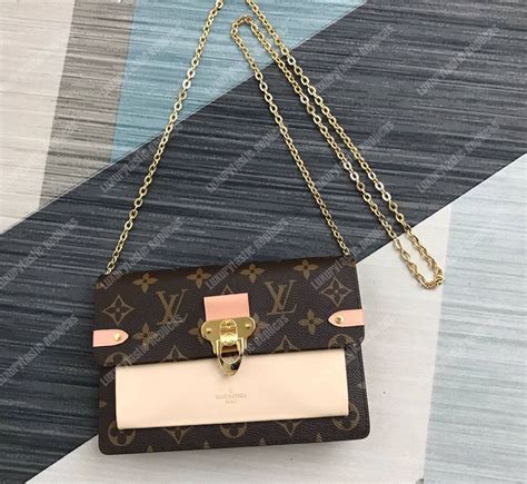 louis vuitton croissant chain wallet|louis vuitton vavin chain wallet.